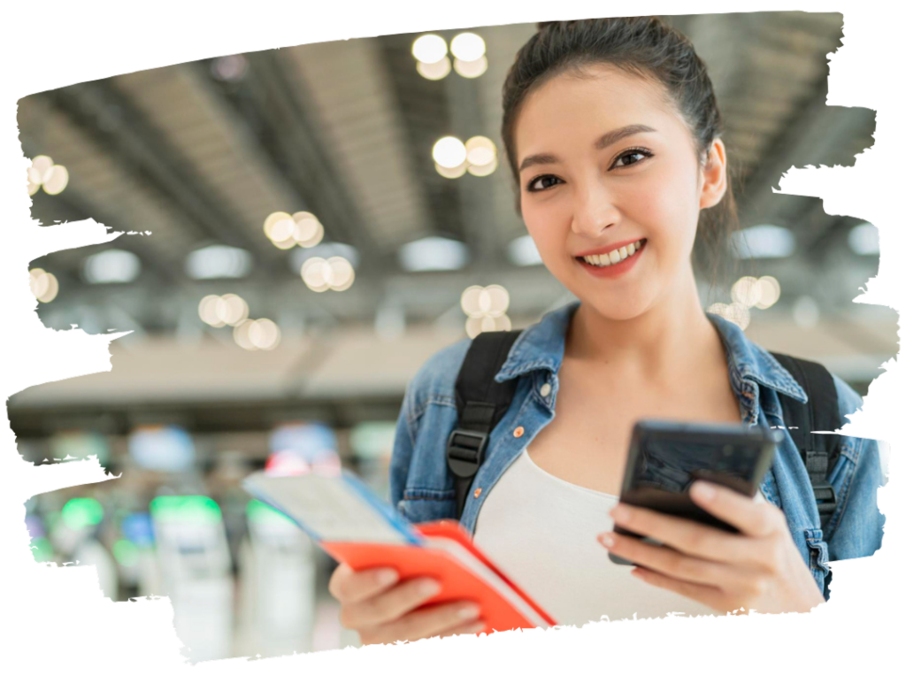 Female traveler checking evisa indonesia entry requirements on phone at airport