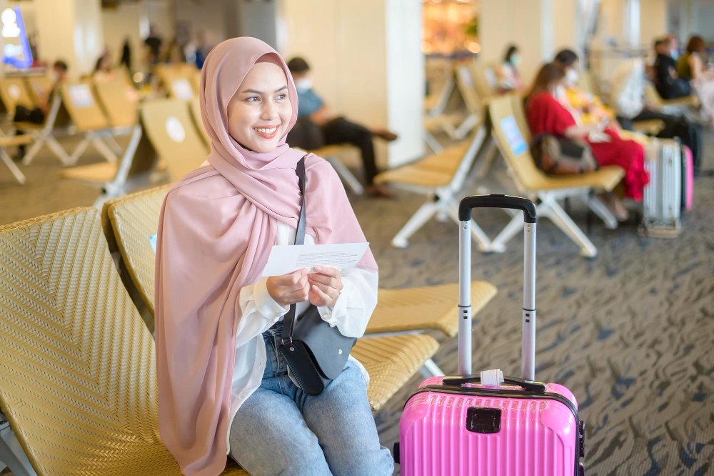 Qatar citizen traveler at international airport preparing to enter Indonesia